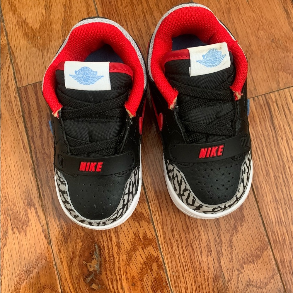 Nike Kids Black and Red Sneakers with White Accents